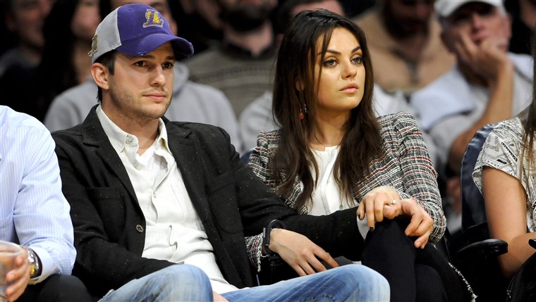 De newly engaged actors Ashton Kutcher and Mila Kunis attend an NBA basketball game between theNew Orleans Pelicans and Los Angeles Lakers, Tuesday, ...