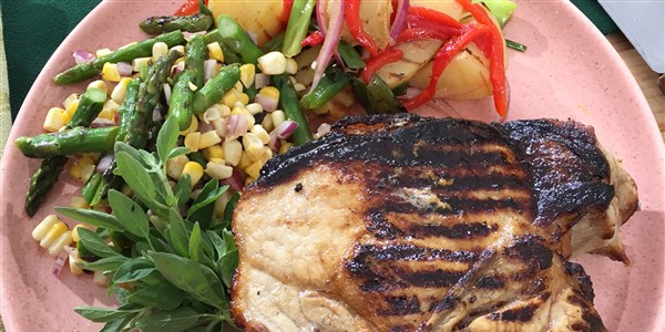 murate Pork Chops with Grilled Asparagus and Corn Salad