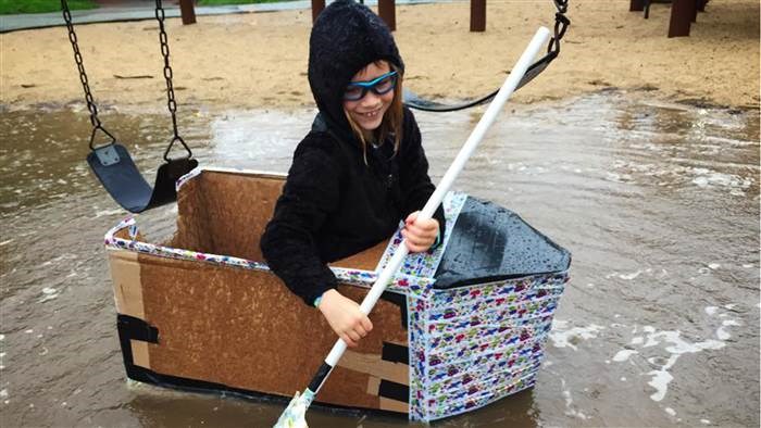 Spela hard! Get messy! Author and blogger Mike Adamick's daughter explores the world in a boat of her own creation.
