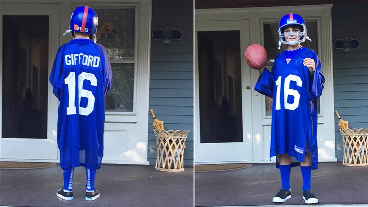 Јоанне LaMarca's son, Mack, shows off the front and back of his Frank Gifford jersey.