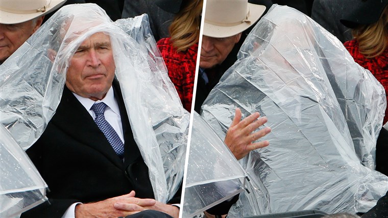 Бивши President George W. Bush uses a plastic sheet to deal with the rain during the inauguration ceremonies swearing in Donald Trump