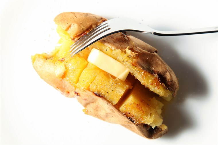 Bakad sweet potato, baked sweet potato with butter, whole baked sweet potato