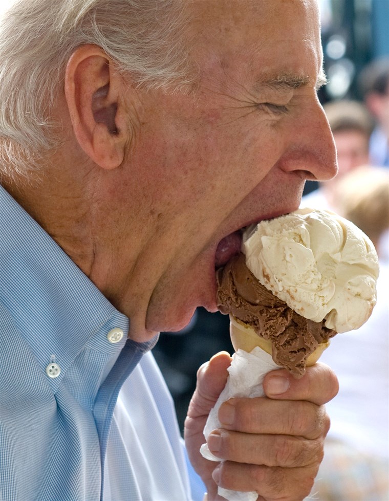 САД Vice Presidential nominee Senator Joe Biden eats an ice cream cone at the Windmill Ice Cream in Aliquippa, Pennsylvania, August 29, 2008, whil...