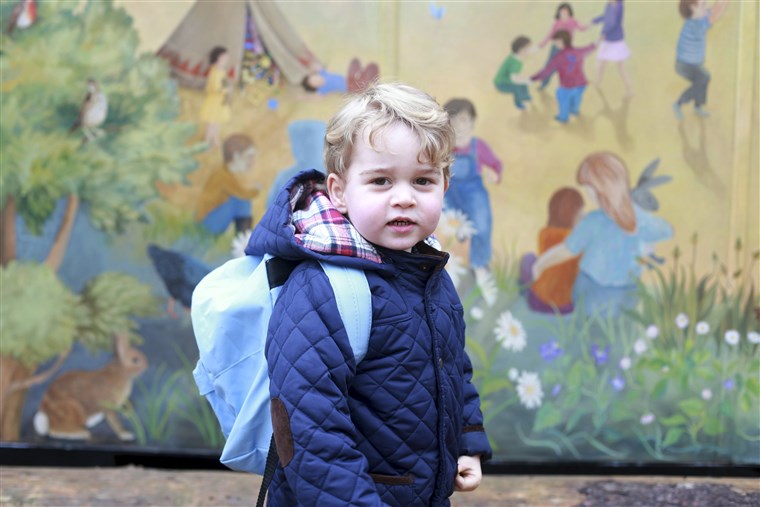 Vaizdas: Britain's Prince George stands outside the Westacre Montessori School nursery in King's Lynn