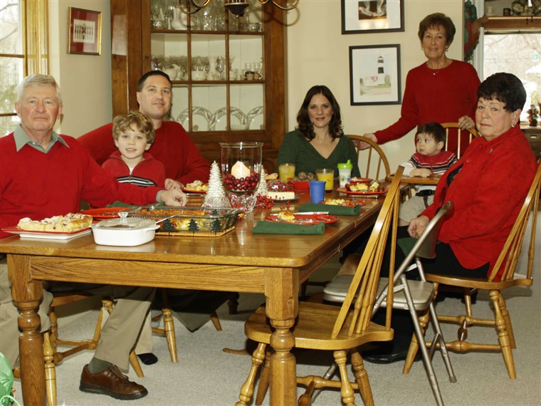  Parker family of Pontiac, Mich., is shown on Christmas Day 2010, minutes before the clear glass baking dish at the head of the table shattered into hundreds of shards, according to Debbie Parker. Parker, standing, said she found glass pieces three feet away under the Christmas tree.