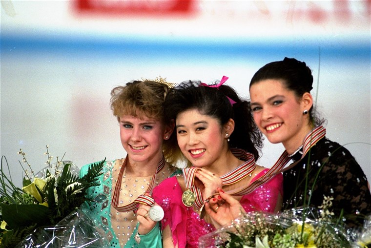 Tonya Harding, Kristi Yamaguchi and Nancy Kerrigan hold up their medals after the World Figure Skating Championships in Munich in 1991.