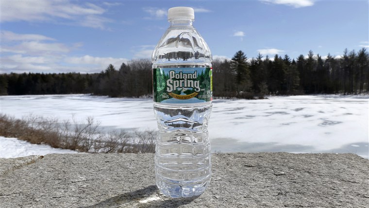 A bottle of Poland Spring water rests on a granite slab in East Derry, N.H., Tuesday, March 5, 2013.