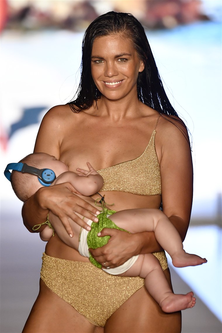 Mara Martin, breastfeeding her daughter while walking Sports Illustrated Swimsuit Runway