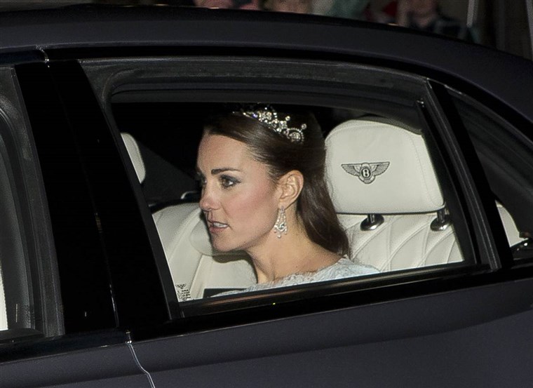 Hertiginna Kate, as she headed to Buckingham Palace reception in 2013.