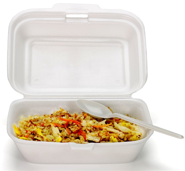 Prăjit rice in Styrofoam box with plastic disposable spoon